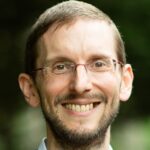 Anton Korinek Advocates AI Integration in Economic Research for Shared Prosperity