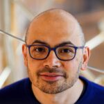 Demis Hassabis Urges Maximum AI Scaling to Achieve AGI Amid Industry Concerns