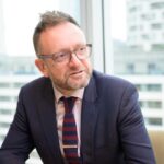 AI Revolutionizes UK Finance: 75% Adoption Sparks Urgent Skills Overhaul and Governance Needs