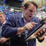 Investors Shift from Tech Giants to Energy and Defensive Stocks Amid AI Concerns